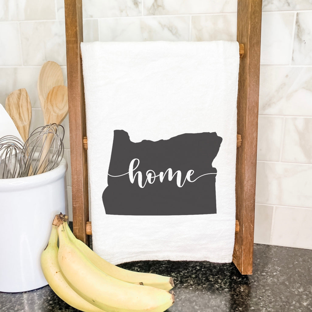 A vibrant cotton tea towel featuring state-themed designs, perfect for kitchen use.