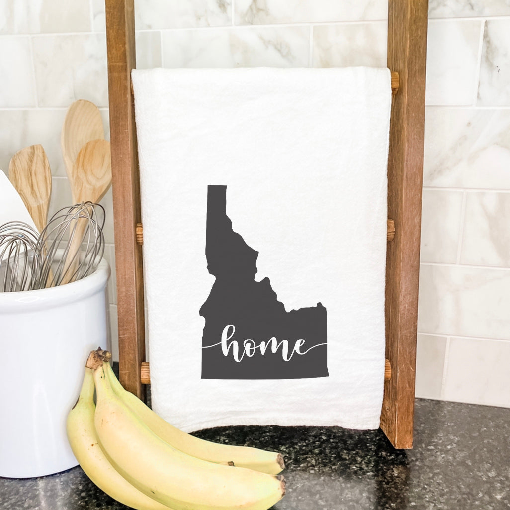 A vibrant cotton tea towel featuring state-themed designs, perfect for kitchen use.