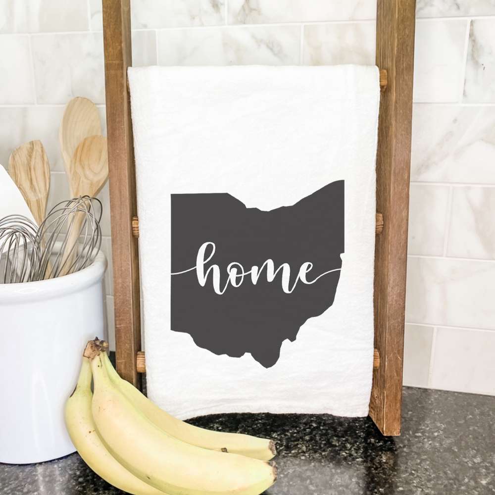 A vibrant cotton tea towel featuring state-themed designs, perfect for kitchen use.