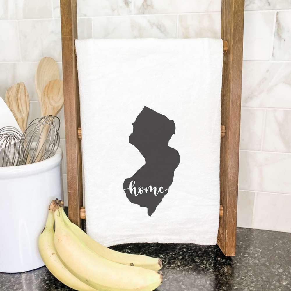 A vibrant cotton tea towel featuring state-themed designs, perfect for kitchen use.