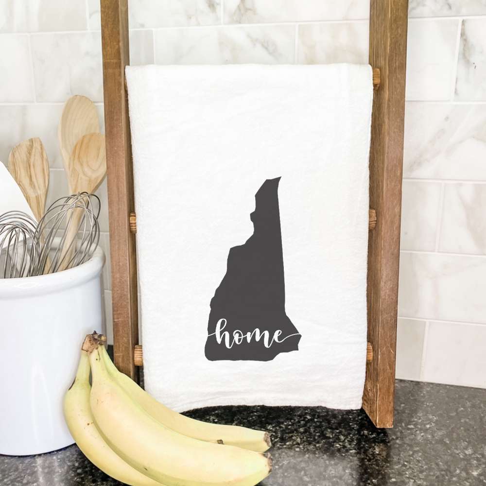 A vibrant cotton tea towel featuring state-themed designs, perfect for kitchen use.