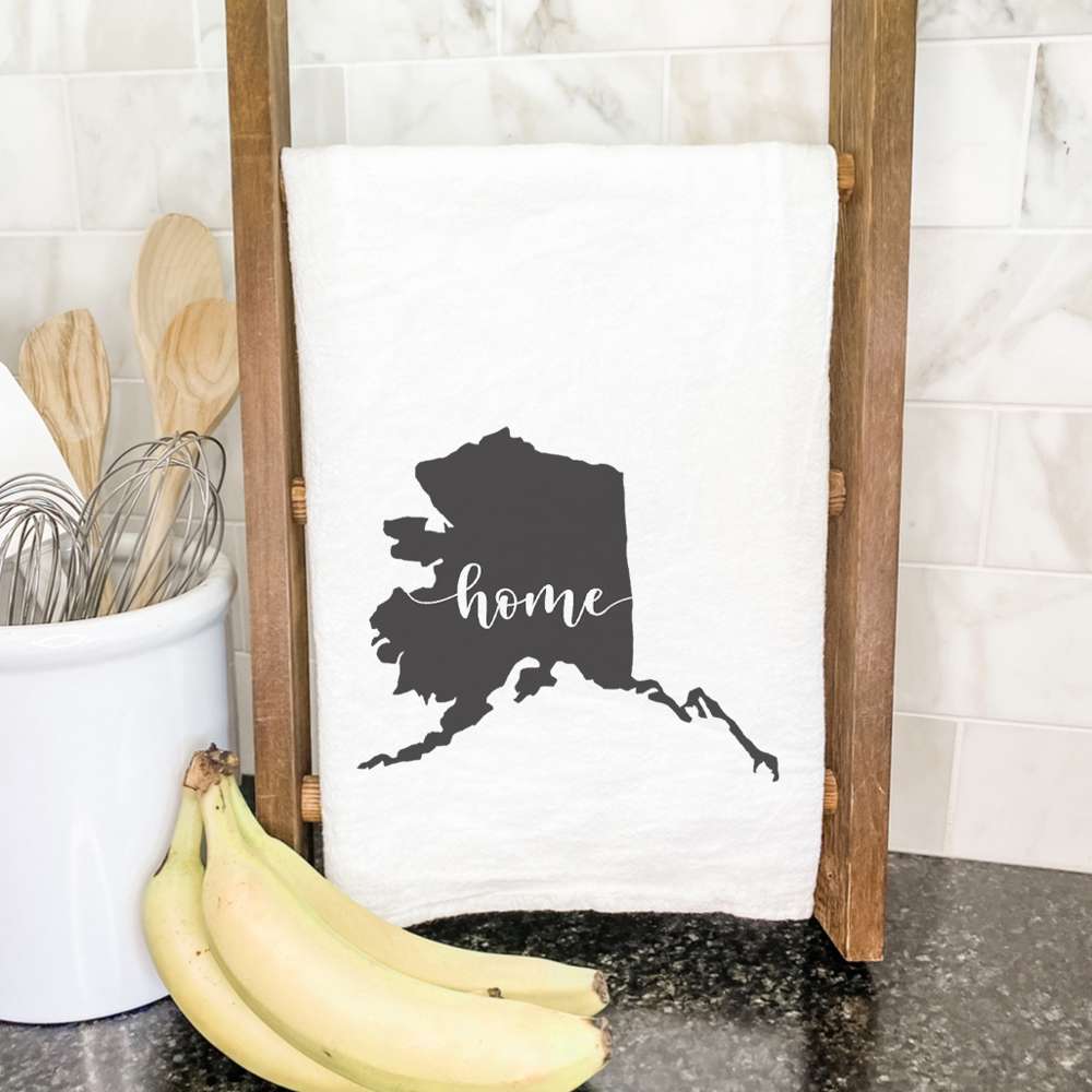 A vibrant cotton tea towel featuring state-themed designs, perfect for kitchen use.