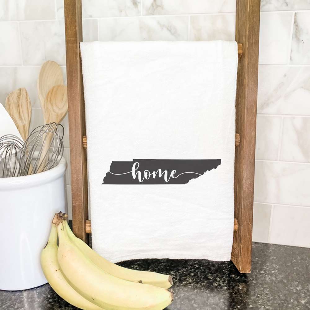 A vibrant cotton tea towel featuring state-themed designs, perfect for kitchen use.