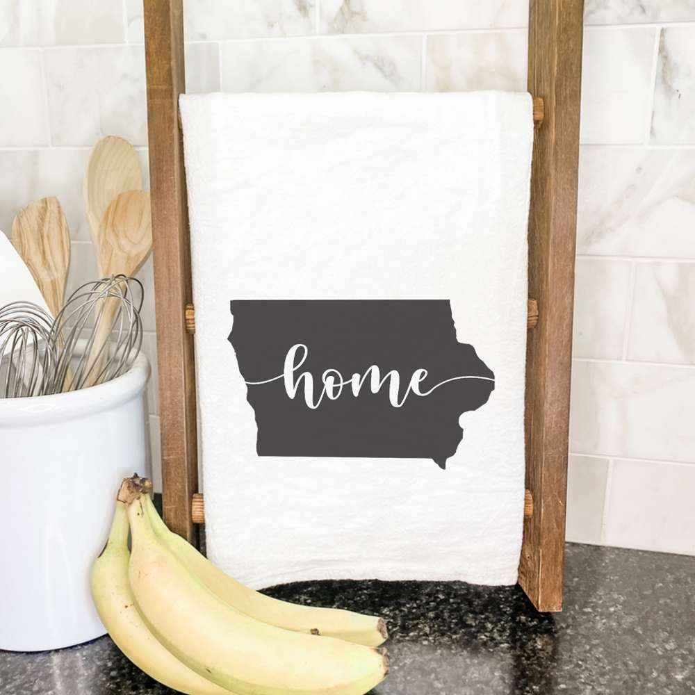 A vibrant cotton tea towel featuring state-themed designs, perfect for kitchen use.