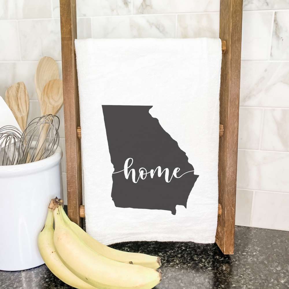 A vibrant cotton tea towel featuring state-themed designs, perfect for kitchen use.