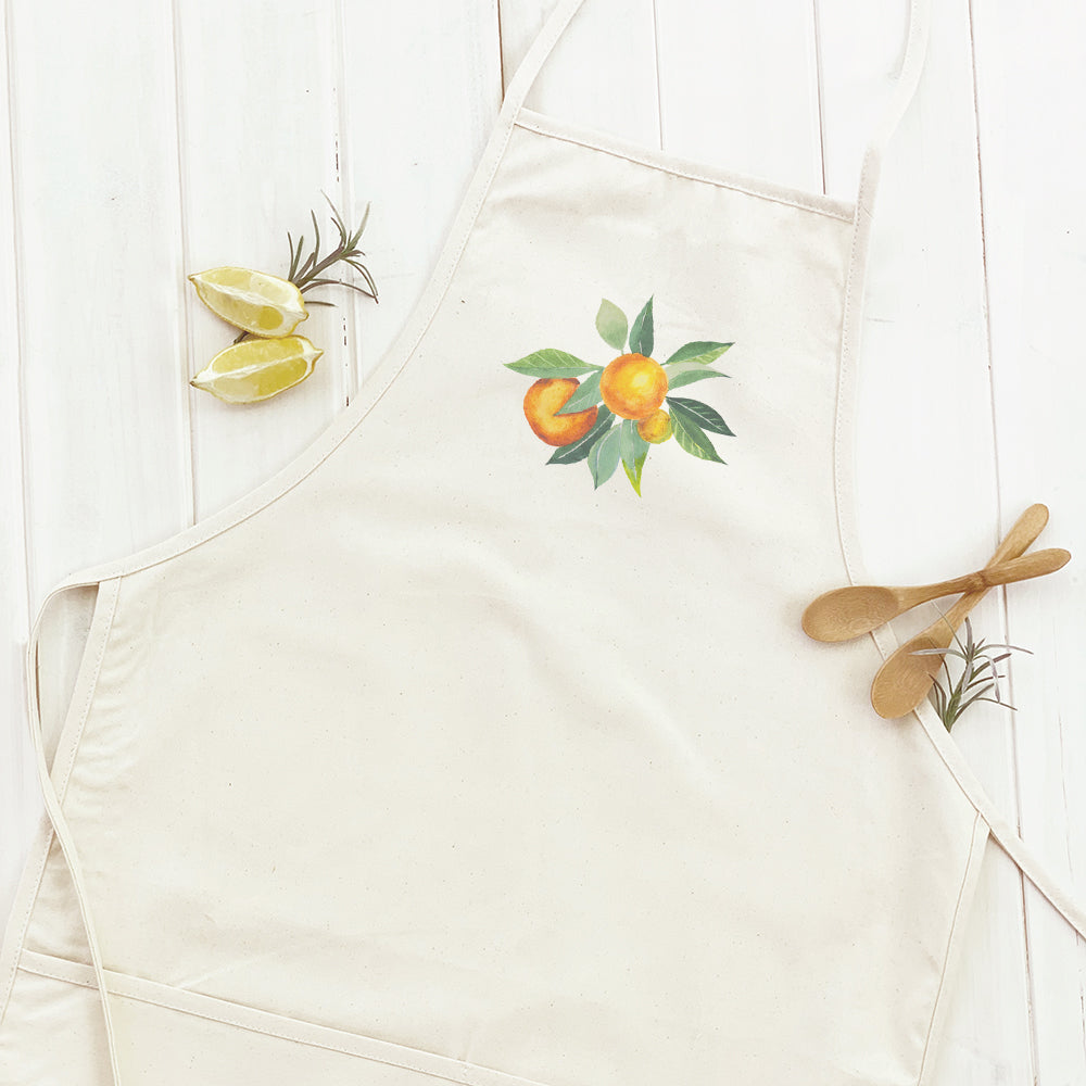 Tangerine Bunch Women's Apron featuring a stylish design, adjustable neck, and divided front pocket, made from durable cotton canvas.