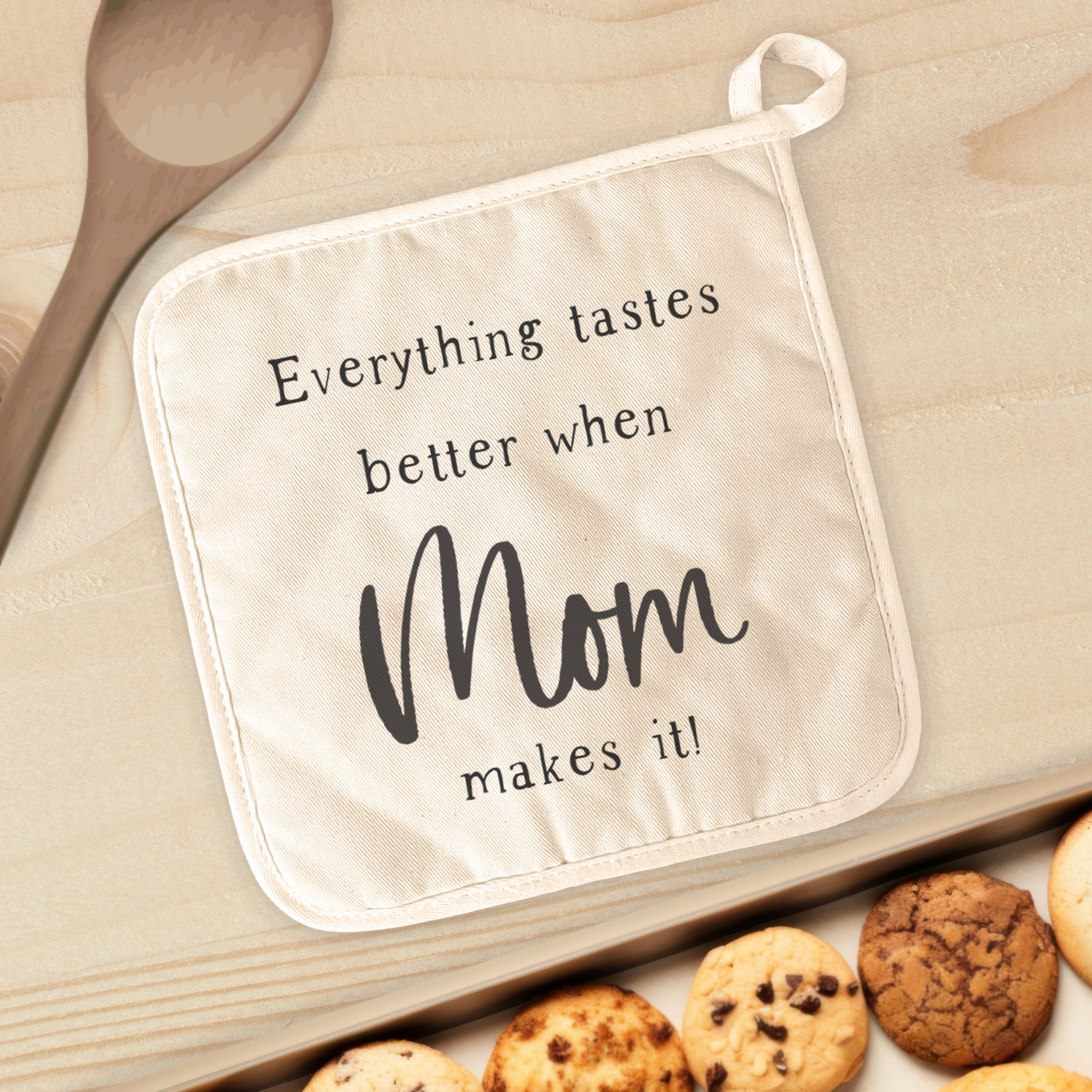 Tastes Better Mom Cotton Pot Holder featuring vibrant designs, made from durable cotton and terry cloth, perfect for handling hot cookware.