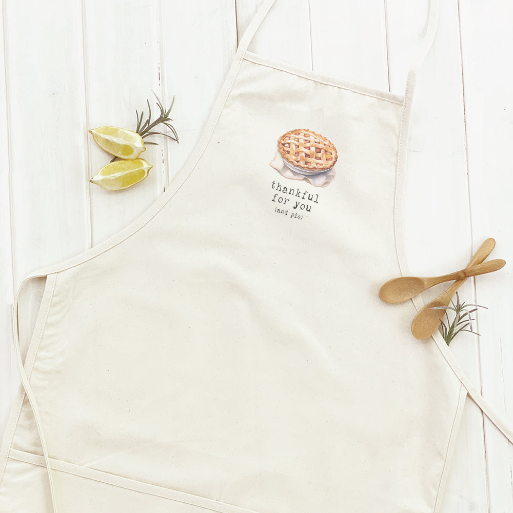 Thankful for Pie Women's Apron featuring elegant design, adjustable neck, and divided front pocket, made from durable cotton canvas.