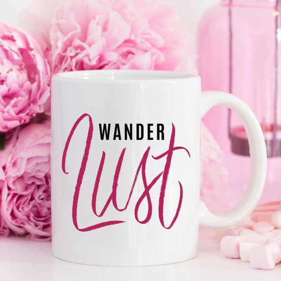 A whimsical 'Wanderlust' coffee mug featuring a funny design, perfect for adventure lovers, made from high-grade ceramic.