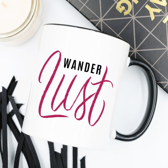 A whimsical 'Wanderlust' coffee mug featuring a funny design, perfect for adventure lovers, made from high-grade ceramic.