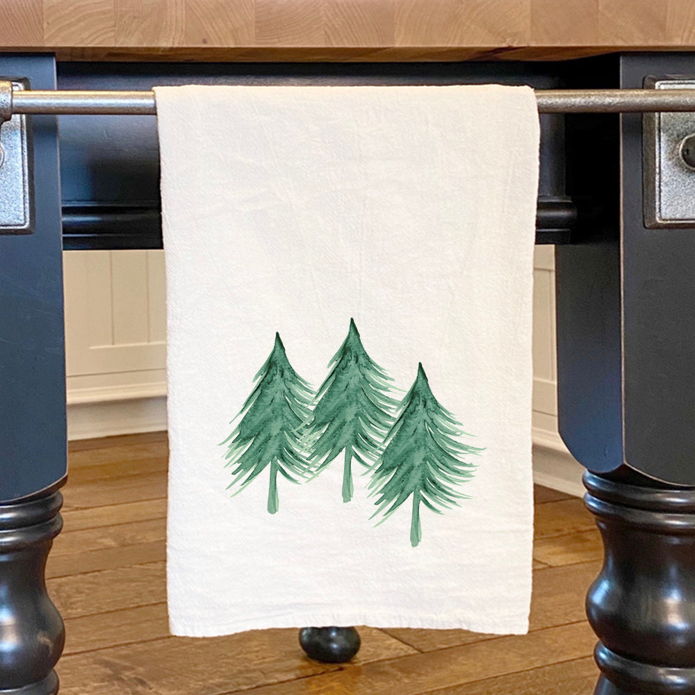 Three Trees Cotton Tea Towel featuring a vibrant nature-inspired design, made from 100% absorbent cotton.