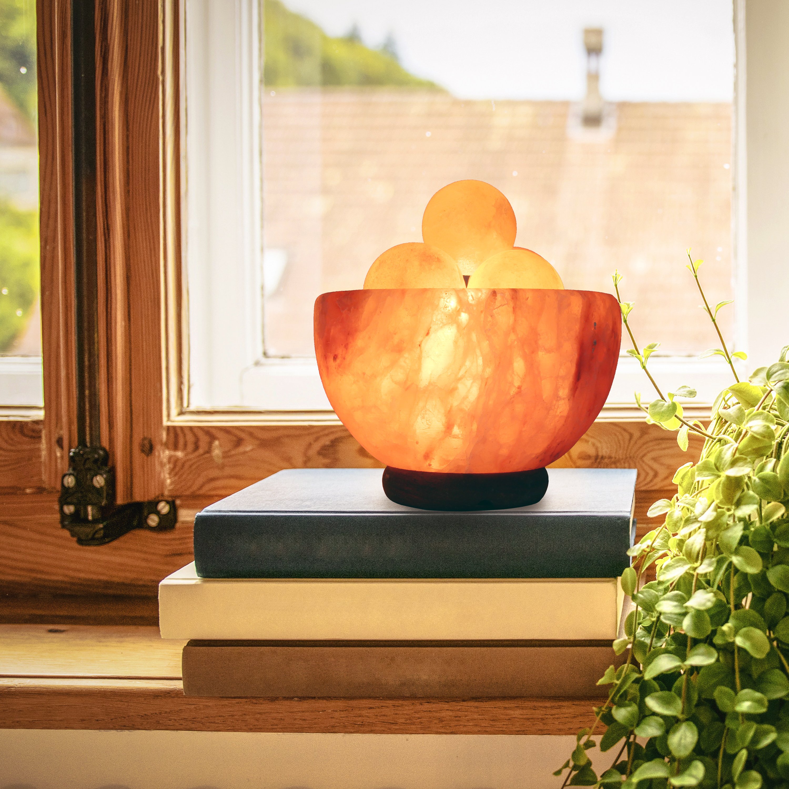 UMAID Natural Himalayan Rock Sea Salt Lamp Bowl with 6 heated massage balls, showcasing a warm amber glow and handcrafted design.