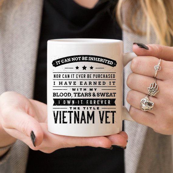 Funny Vietnam veteran coffee mug with a heartfelt message, showcasing its ceramic design and vibrant print.