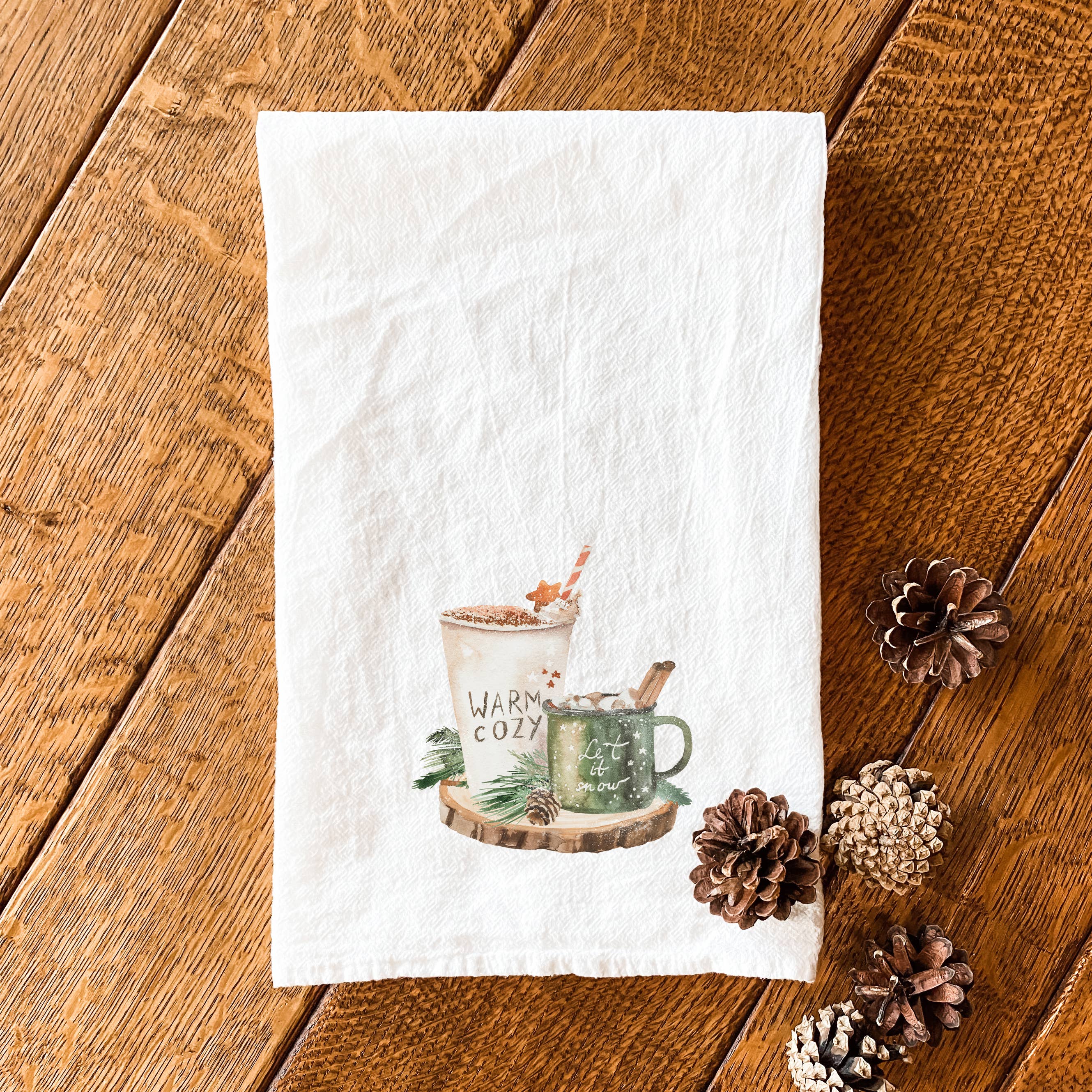 Warm Drinks Cotton Tea Towel featuring vibrant designs and hemmed edges, perfect for kitchen use.