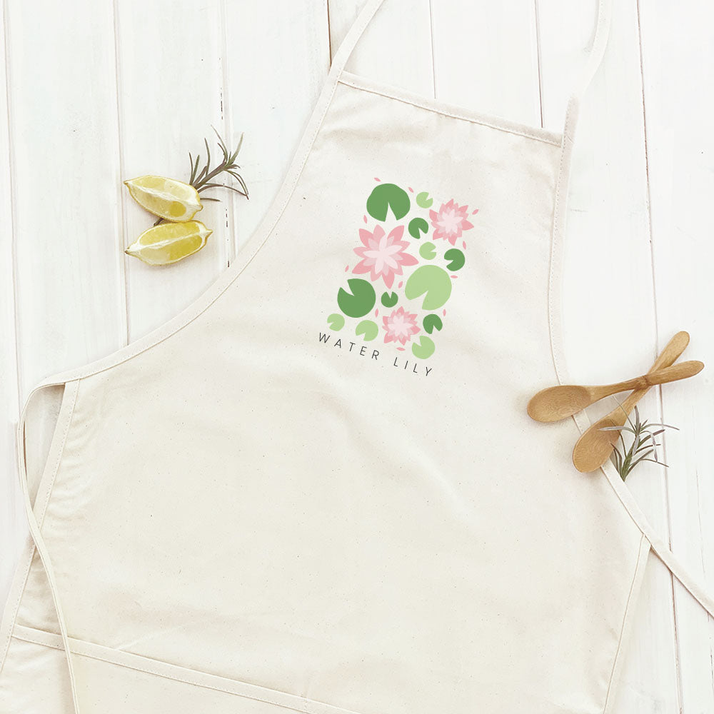 Water Lily Women's Apron featuring elegant design, cotton canvas fabric, and natural twill ties.