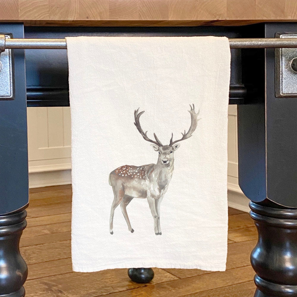 A vibrant Watercolor Buck Cotton Tea Towel featuring a beautiful buck design, made from 100% absorbent cotton.