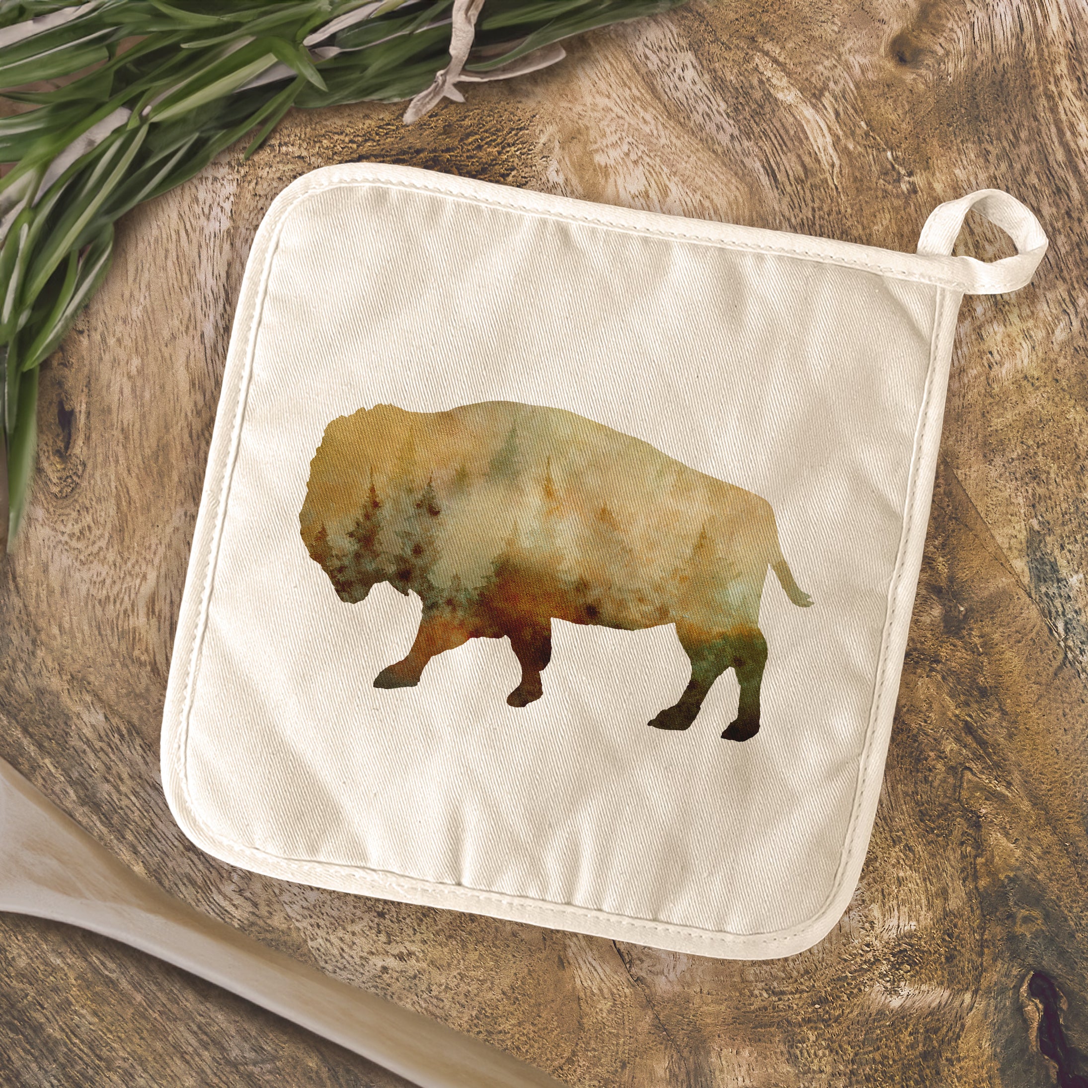 Watercolor Buffalo Cotton Pot Holder featuring vibrant buffalo design, quilted terry cloth, and convenient hanging loop.