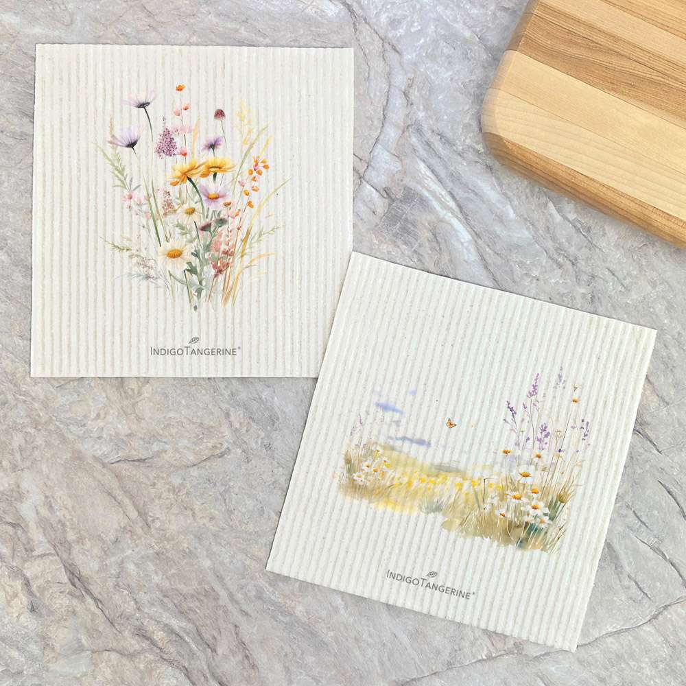 Two Swedish dish cloths featuring watercolor meadow flowers design, eco-friendly and compostable.