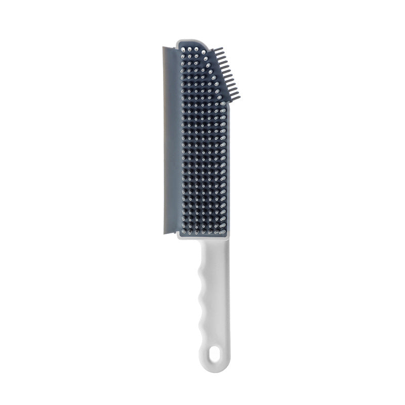 A lightweight and durable Window Silicone Multifunctional All Purpose Cleaning Brush with soft round heads and a side scraper for efficient cleaning.