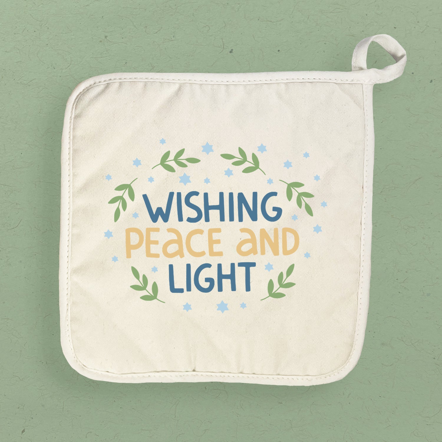 Wishing Peace and Light cotton pot holder featuring vibrant designs and a convenient hanging loop, perfect for kitchen use.