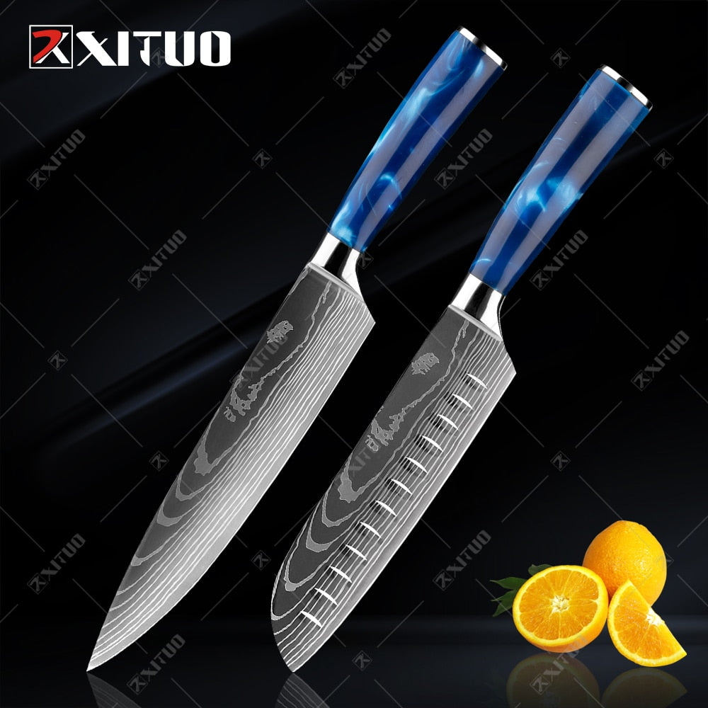 XITUO kitchen knives set featuring blue resin handles and laser Damascus blades, elegantly displayed in a knife holder.