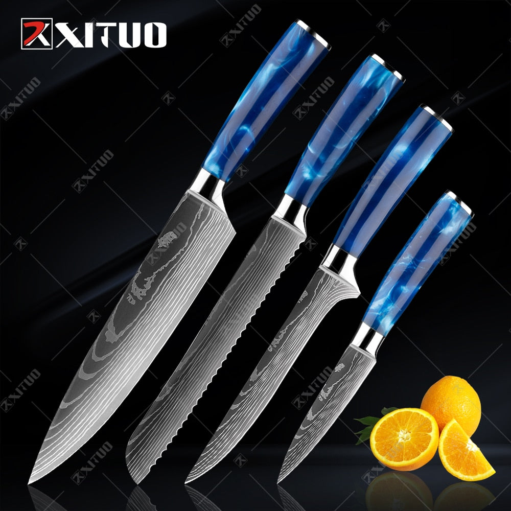 XITUO kitchen knives set featuring blue resin handles and laser Damascus blades, elegantly displayed in a knife holder.