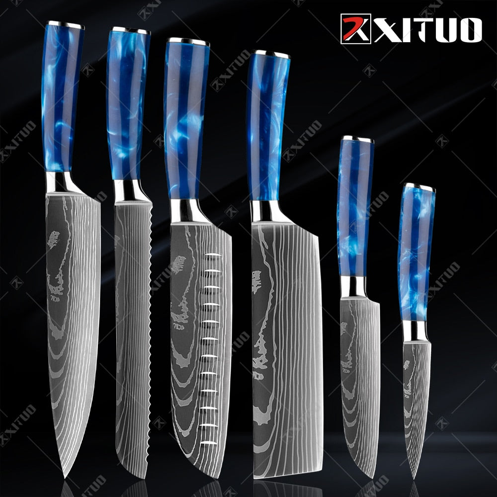 XITUO kitchen knives set featuring blue resin handles and laser Damascus blades, elegantly displayed in a knife holder.