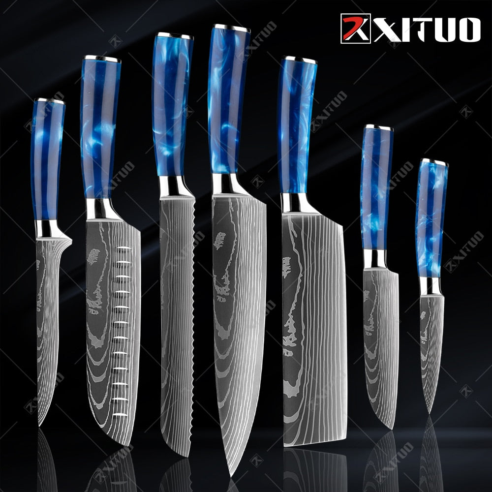 XITUO kitchen knives set featuring blue resin handles and laser Damascus blades, elegantly displayed in a knife holder.