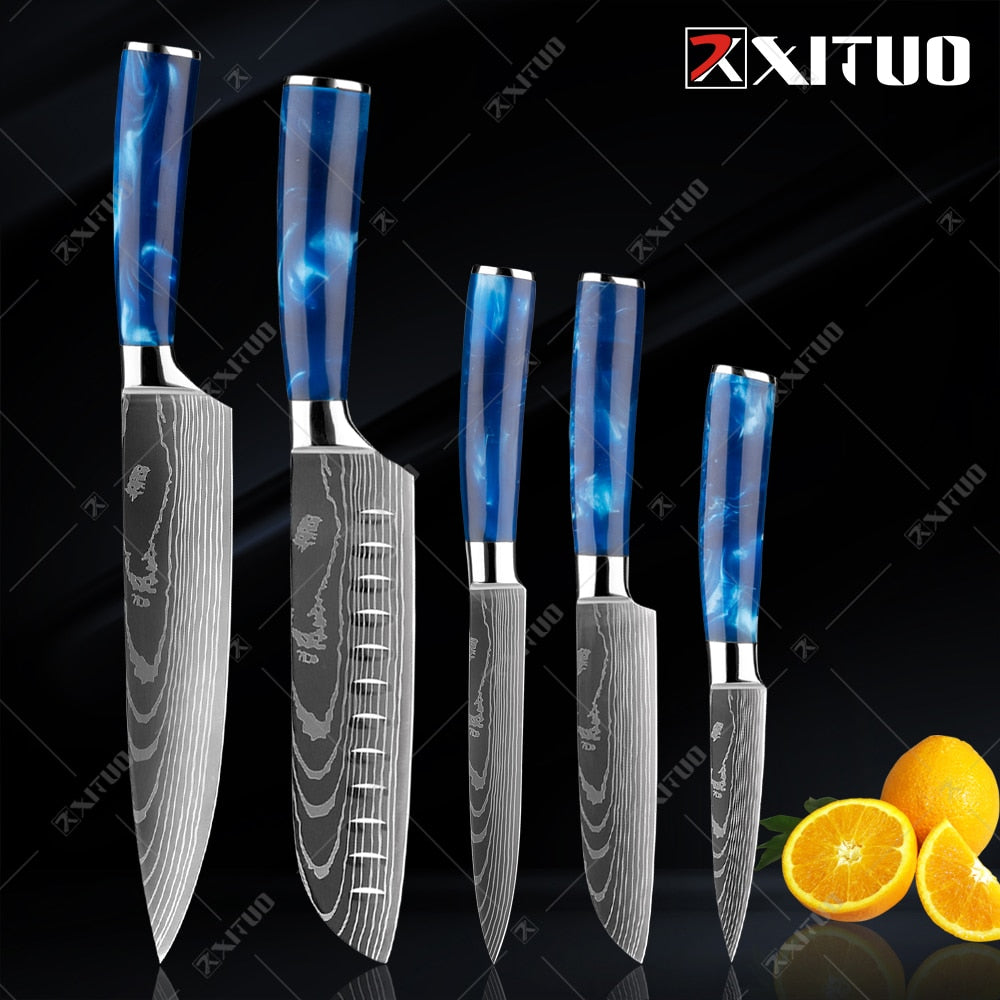 XITUO kitchen knives set featuring blue resin handles and laser Damascus blades, elegantly displayed in a knife holder.