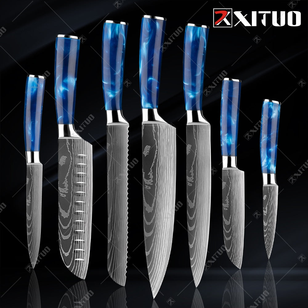 XITUO kitchen knives set featuring blue resin handles and laser Damascus blades, elegantly displayed in a knife holder.