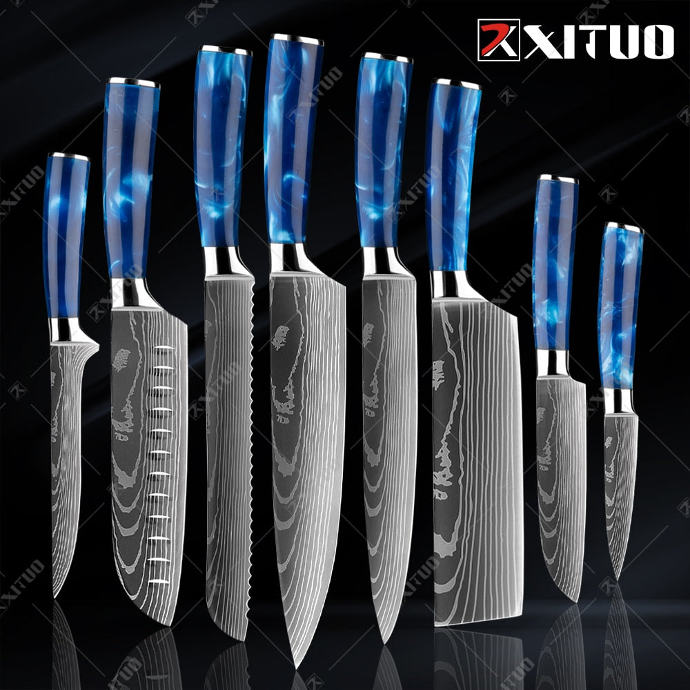 XITUO kitchen knives set featuring blue resin handles and laser Damascus blades, elegantly displayed in a knife holder.