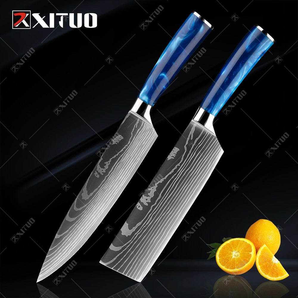 XITUO kitchen knives set featuring blue resin handles and laser Damascus blades, elegantly displayed in a knife holder.