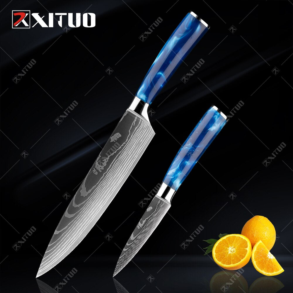 XITUO kitchen knives set featuring blue resin handles and laser Damascus blades, elegantly displayed in a knife holder.