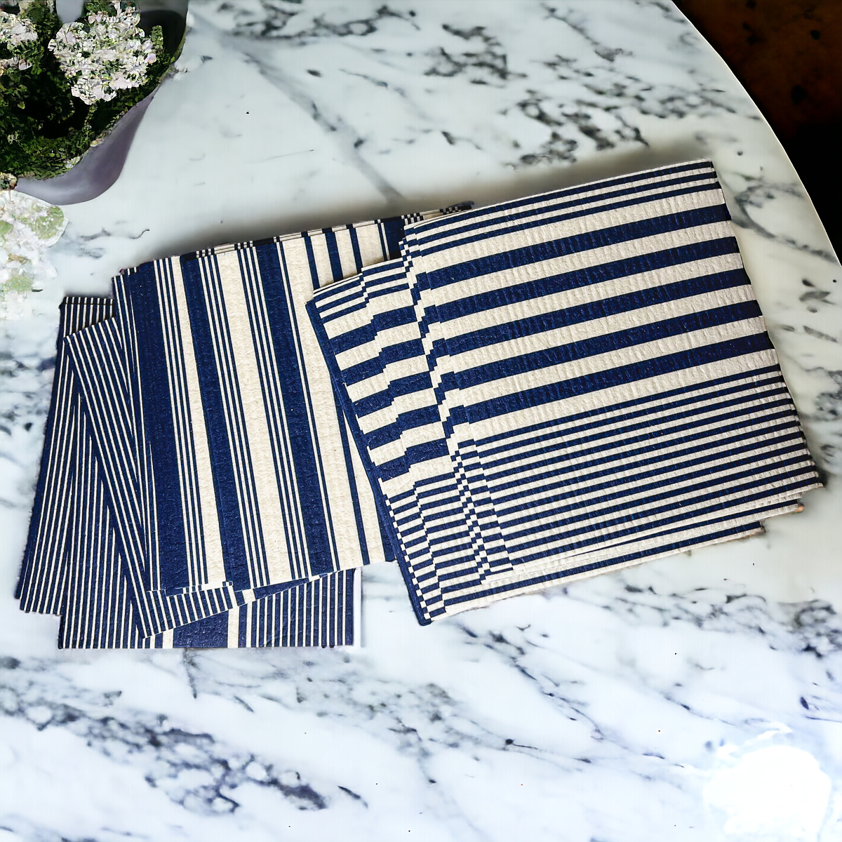 Yacht Club Biodegradable Cloth in three stylish designs, perfect for eco-friendly cleaning in kitchens and bathrooms.