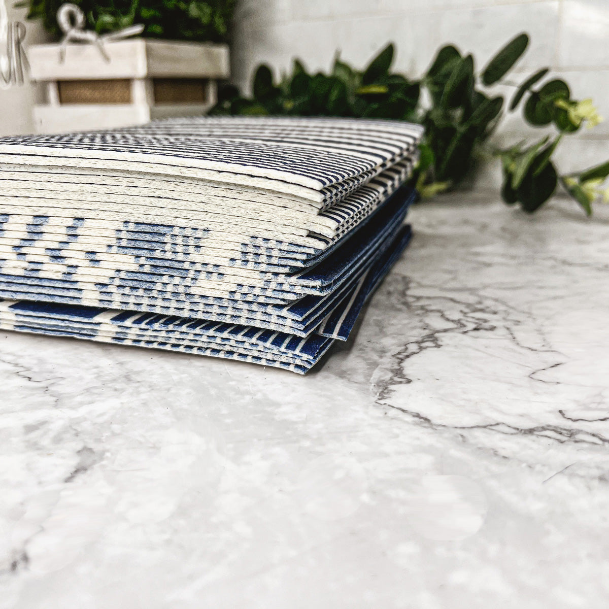 Yacht Club Biodegradable Cloth in three stylish designs, perfect for eco-friendly cleaning in kitchens and bathrooms.