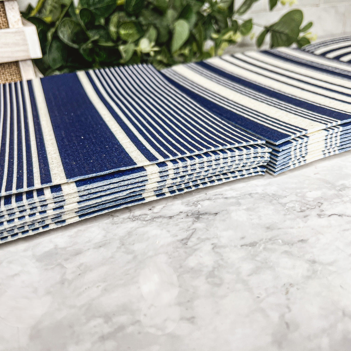 Yacht Club Biodegradable Cloth in three stylish designs, perfect for eco-friendly cleaning in kitchens and bathrooms.