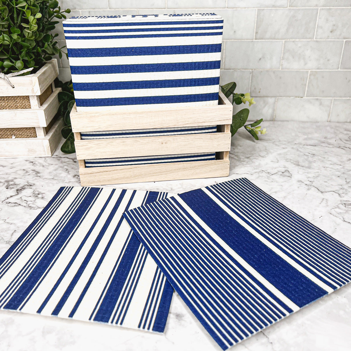 Yacht Club Biodegradable Cloth in three stylish designs, perfect for eco-friendly cleaning in kitchens and bathrooms.