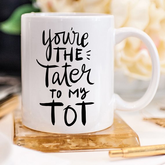 You're The Tater To My Tot funny coffee mug with a playful design, perfect for friends and coffee lovers.