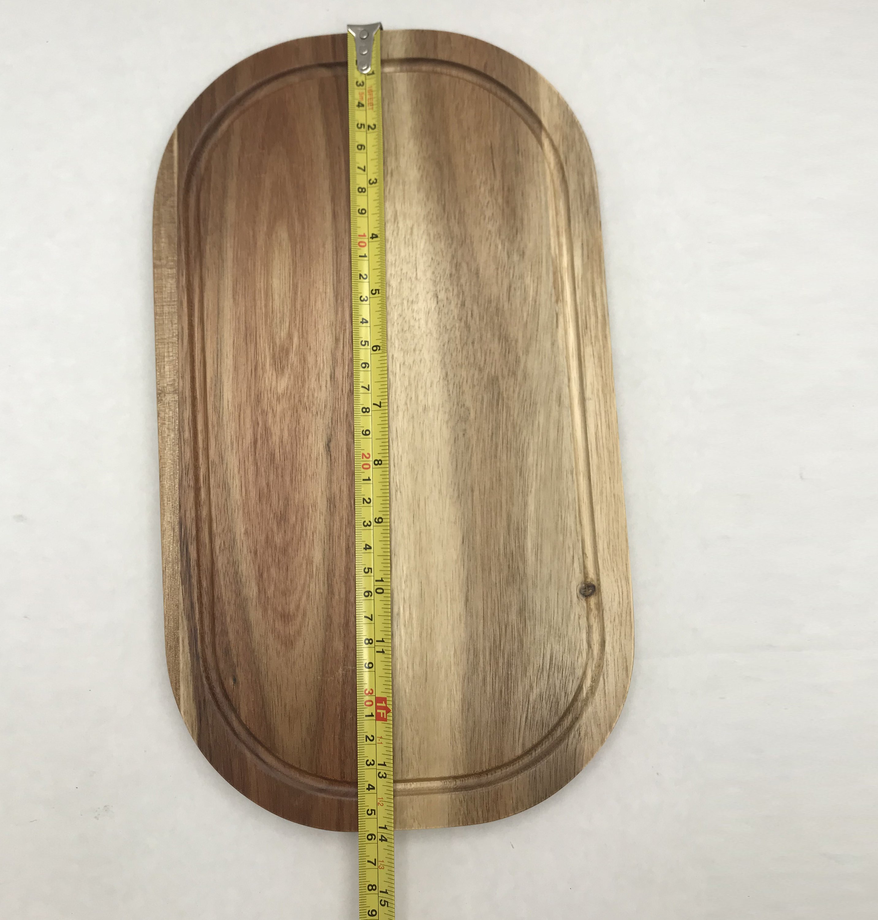 Zavis Green Acacia Wood Serving Rounded Cutting Board showcasing its elegant design and natural wood finish.