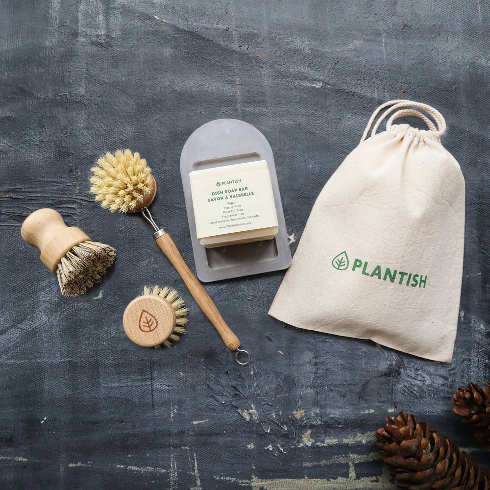 Zero Waste Cleaning Set featuring a soap bar, sisal brushes, and a bamboo soap dish, all designed for eco-friendly cleaning.