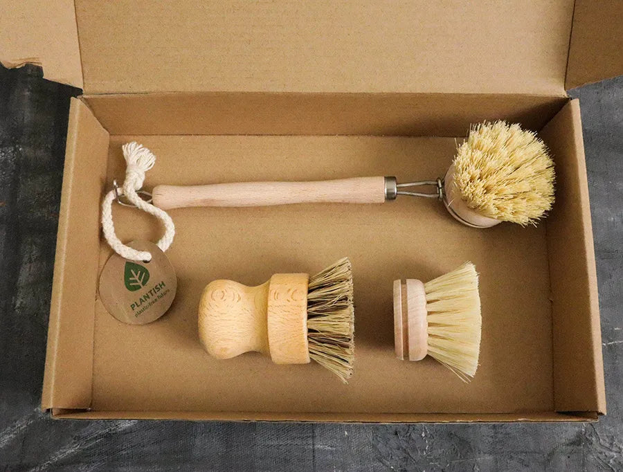 Zero Waste Kitchen Brush Set featuring sisal and palm brushes with a bamboo handle, perfect for eco-friendly cleaning.