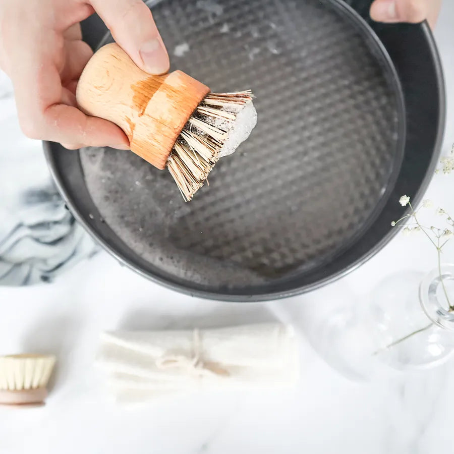 Zero Waste Kitchen Brush Set featuring sisal and palm brushes with a bamboo handle, perfect for eco-friendly cleaning.