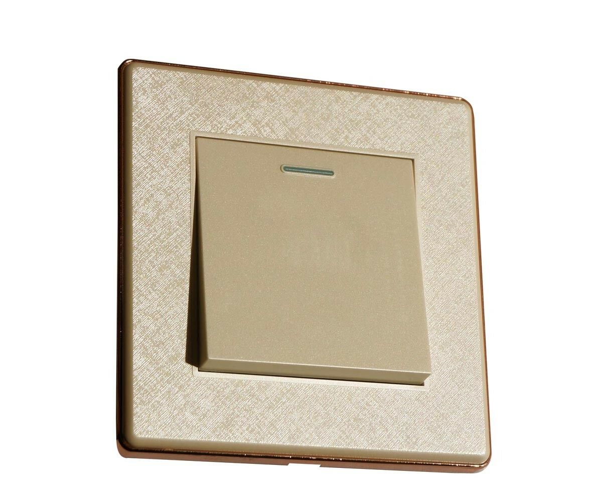 Brushed gold 1/2/3 gang wall switch with screwless design, showcasing modern aesthetics and safety features.