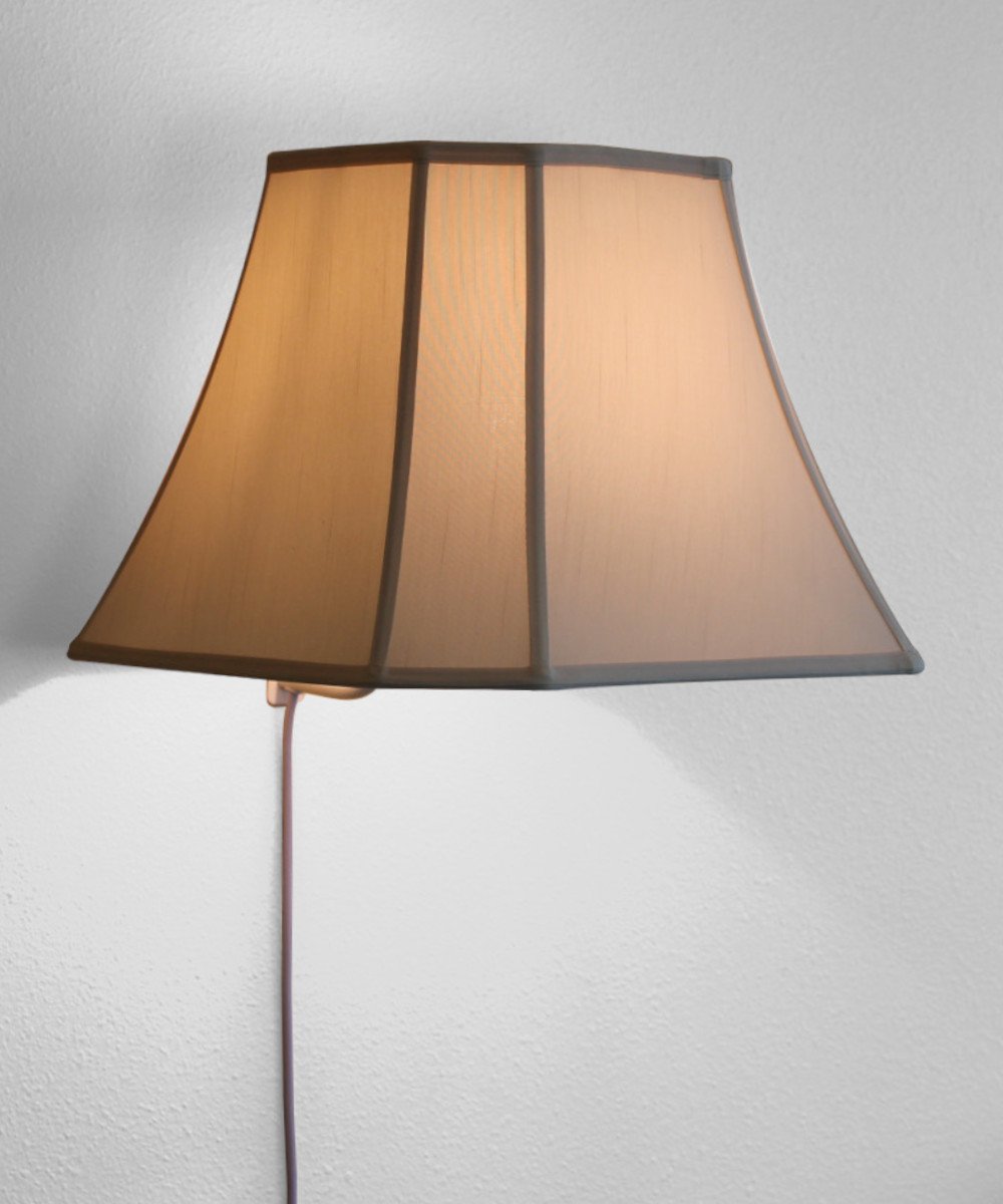 16-inch floating shade plug-in wall light in eggshell color, featuring a minimalist design with a lampshade that appears to float on the wall.