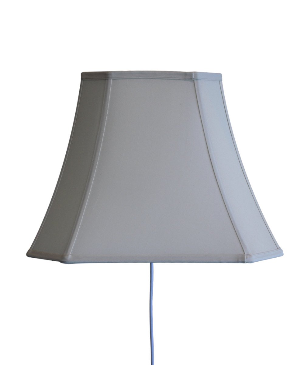 16-inch floating shade plug-in wall light in eggshell color, featuring a minimalist design with a lampshade that appears to float on the wall.