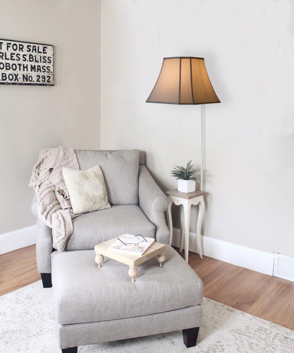 16-inch floating shade plug-in wall light in eggshell color, featuring a minimalist design with a lampshade that appears to float on the wall.