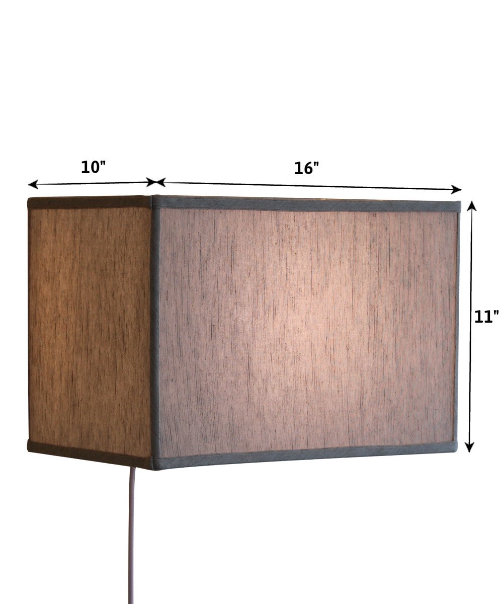 16-inch Floating Shade Plug-In Wall Light with textured oatmeal fabric shade, showcasing a minimalist design that appears to float on the wall.