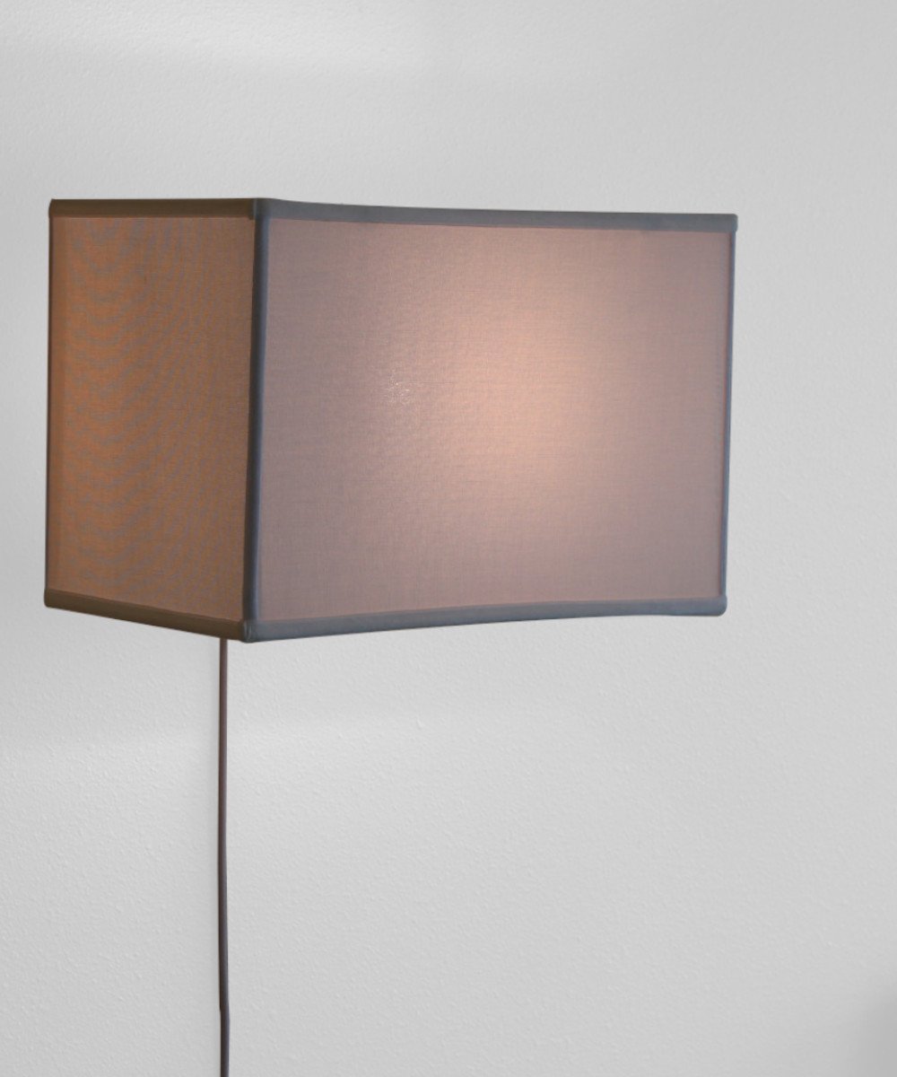 16-inch white floating shade plug-in wall light with a minimalist design, featuring a fabric lampshade and a rotary dimmer switch.