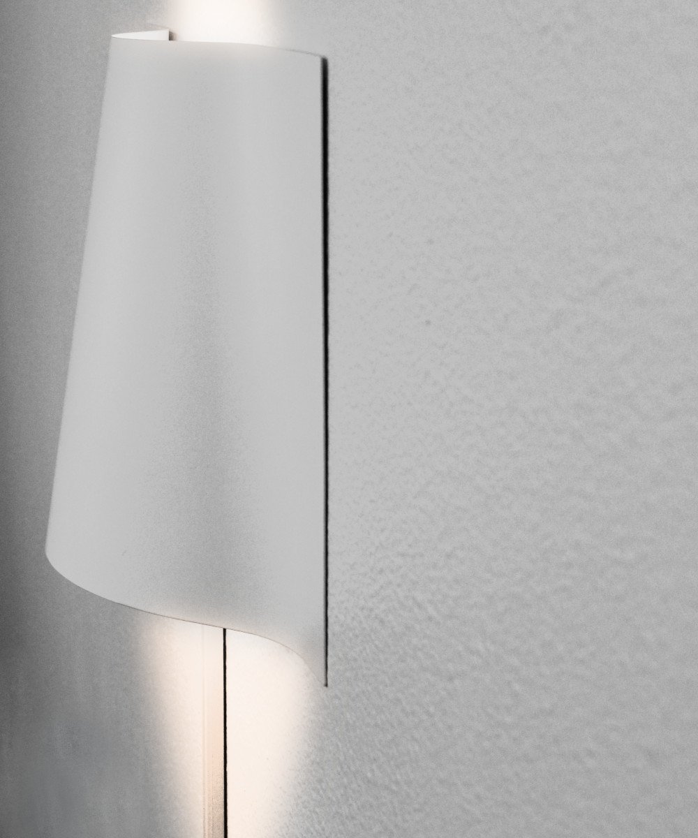 16-inch Surface Wave Curved Metal LED Wall Light with a unique wave design, mounted on a wall, showcasing its elegant and modern appearance.