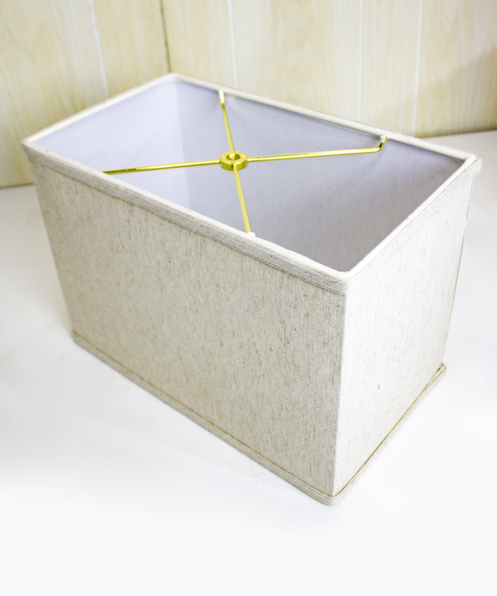 16-inch wide by 11-inch high rectangular drum lampshade in textured oatmeal fabric with white lining, featuring a spider fitter for easy installation.